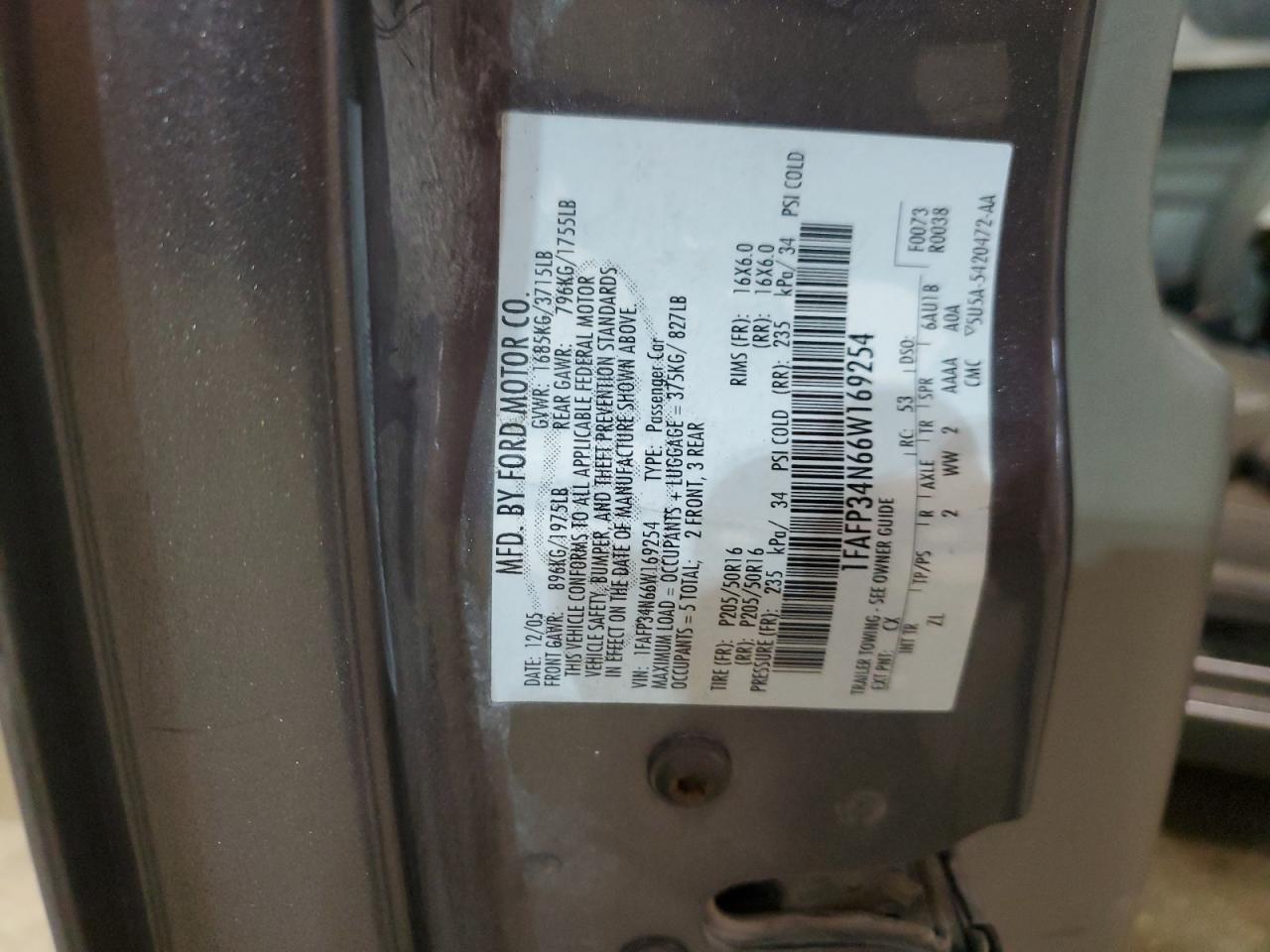 2006 Ford Focus VIN 1FAFP34N66W169254 Copart auction photo, rear end / side damage thumbnail 13