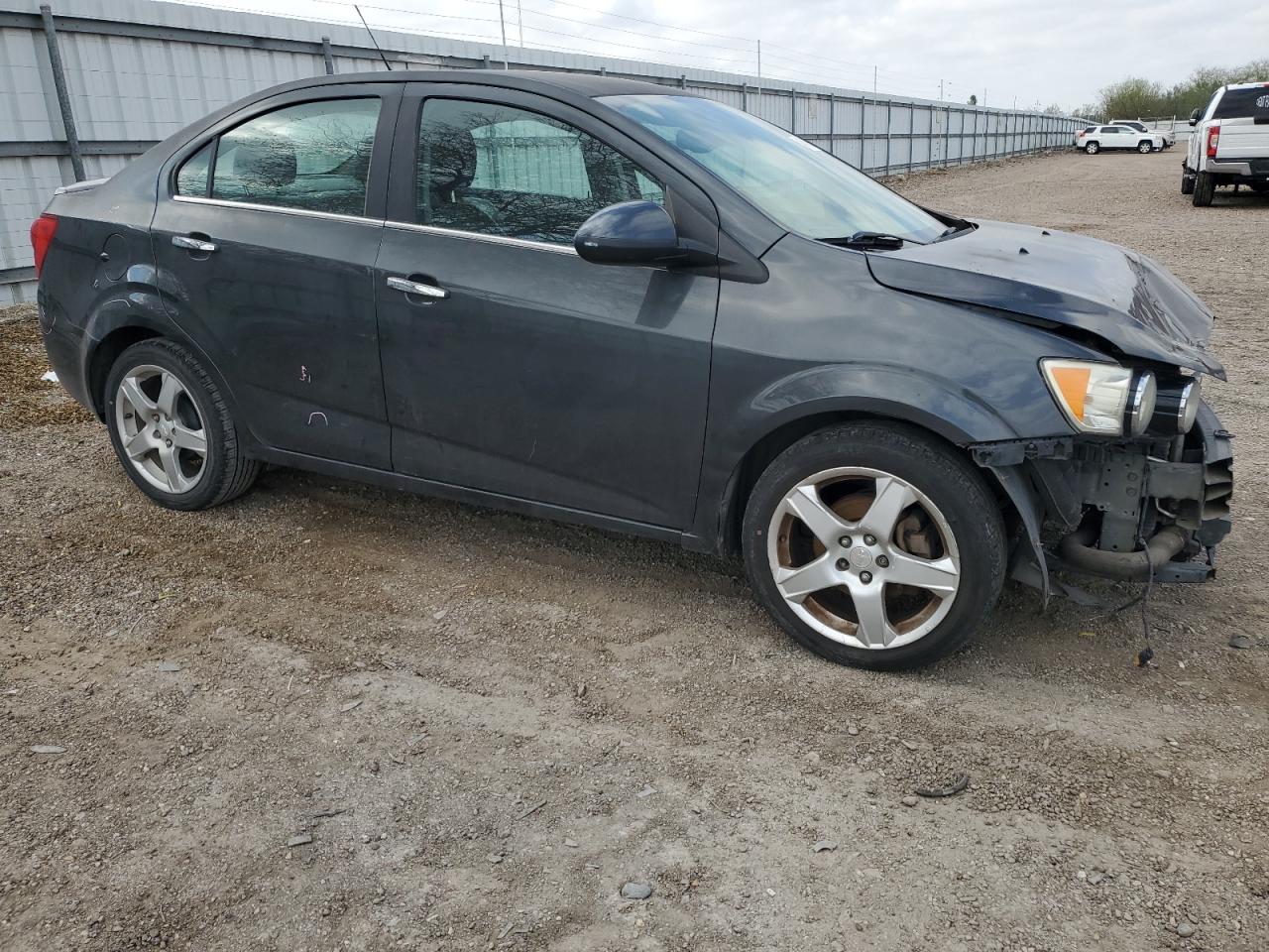 2015 Chevrolet Sonic VIN 1G1JE5SB5F4115706 Copart auction photo, front end / all over damage thumbnail 4