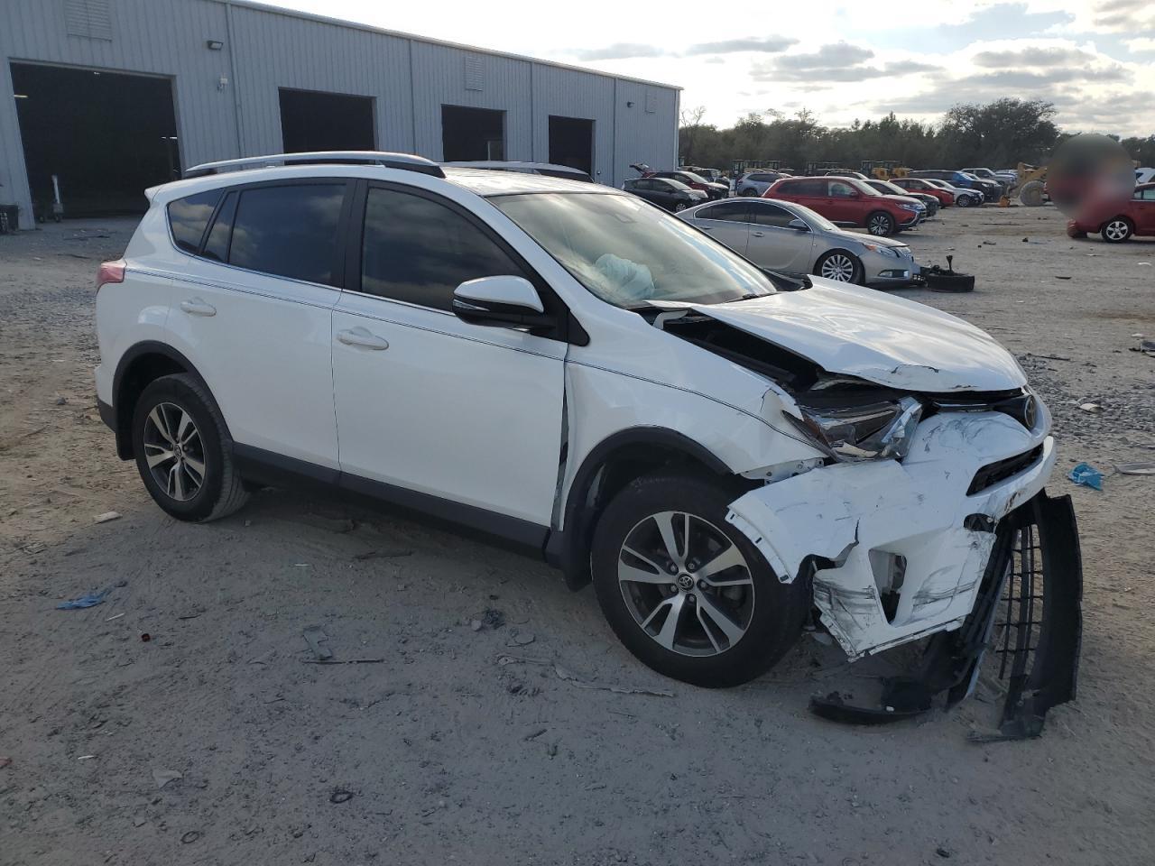 2017 Toyota RAV 4 VIN JTMRFREV4HJ704139 Copart auction photo, front end damage thumbnail 4