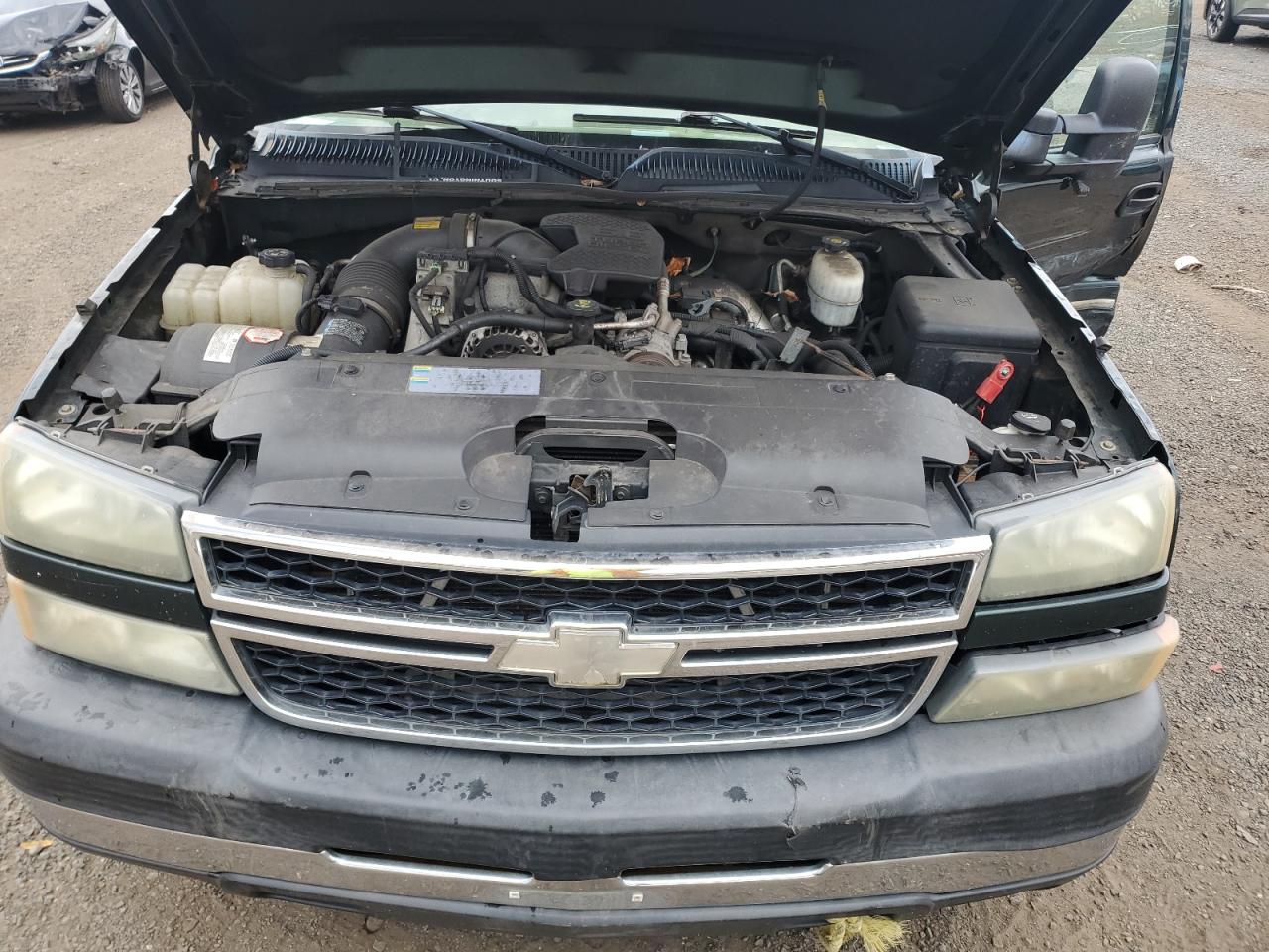 2006 Chevrolet Silverado VIN 1GCHC29D66E173271 Copart auction photo, side / minor dent/scratches damage thumbnail 12