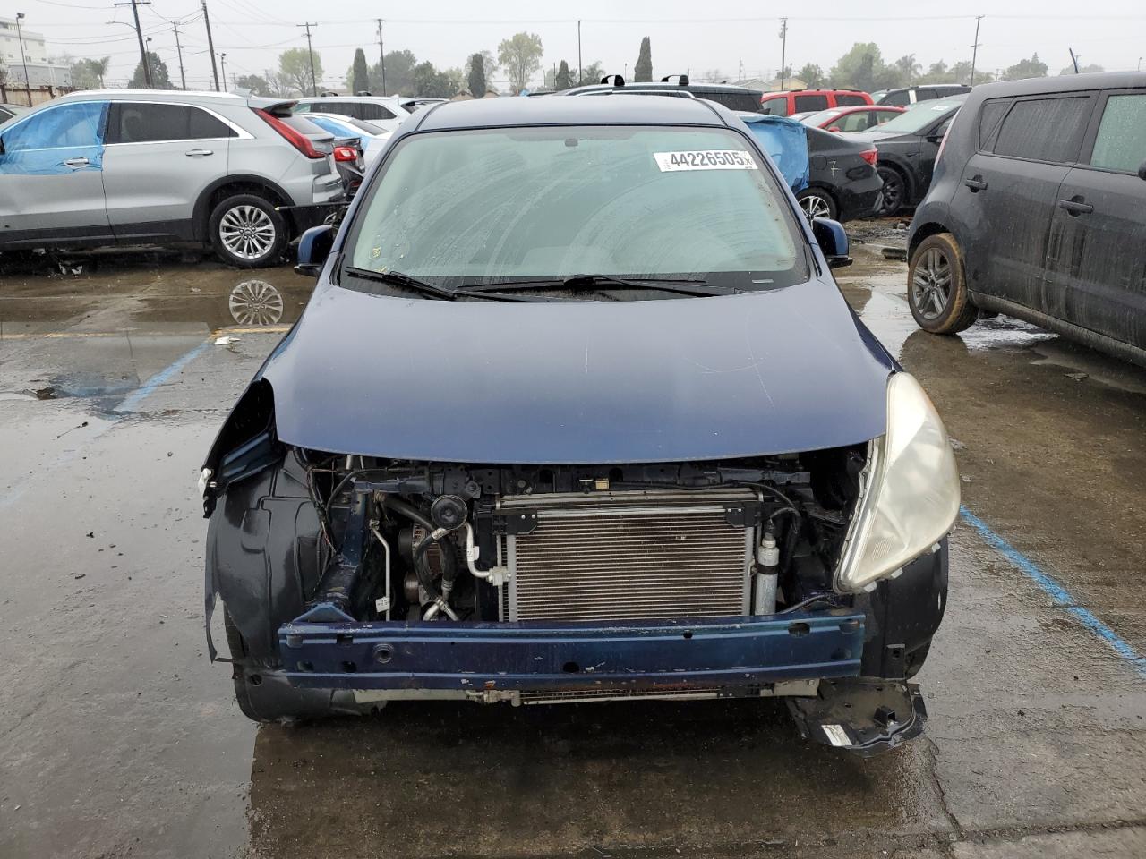 2012 Nissan Versa VIN 3N1CN7AP7CL940230 Copart auction photo, vandalism / front end damage thumbnail 5