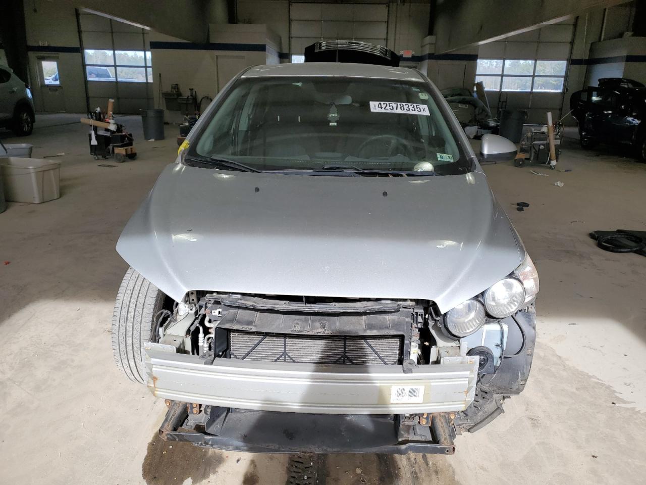 2012 Chevrolet Sonic VIN 1G1JC5SH3C4108047 Copart auction photo, front end / mechanical damage thumbnail 5