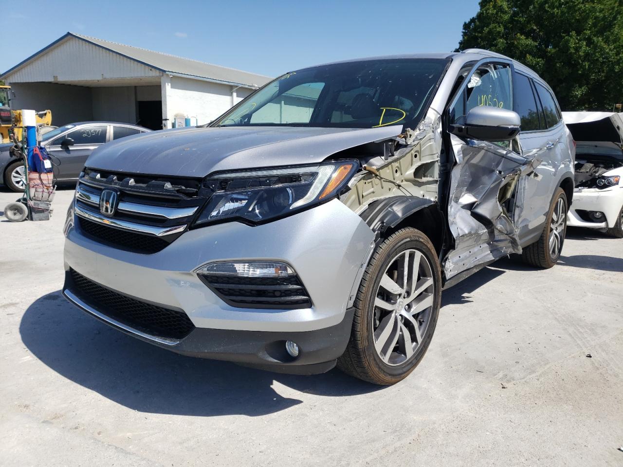 2017 Honda Pilot VIN 5FNYF5H95HB000106 Copart auction photo, side / front end damage thumbnail 2
