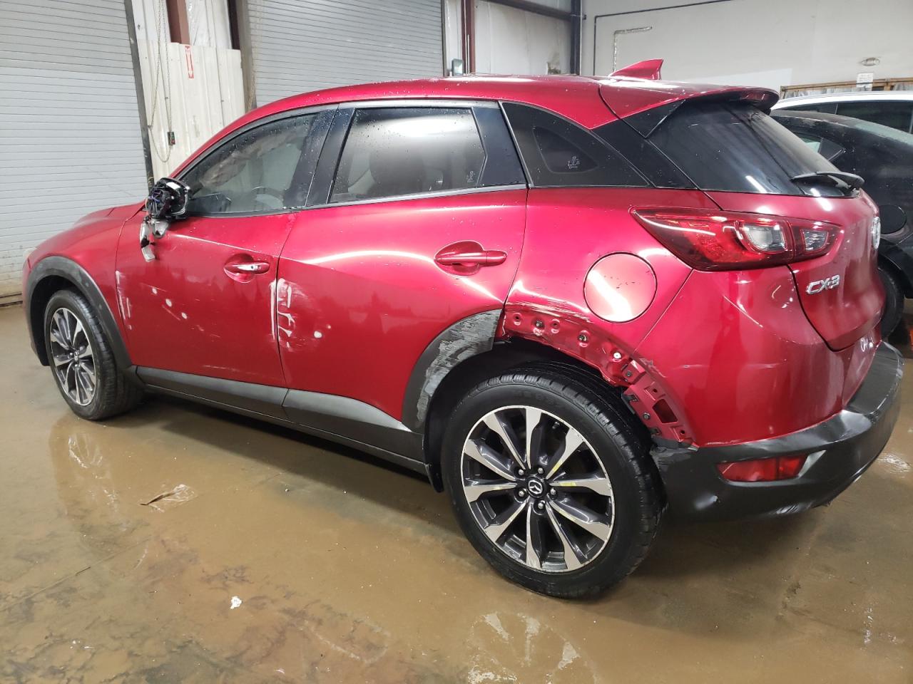 2019 Mazda CX-3 VIN JM1DKDC75K1416408 Copart auction photo, side / rear end damage thumbnail 2