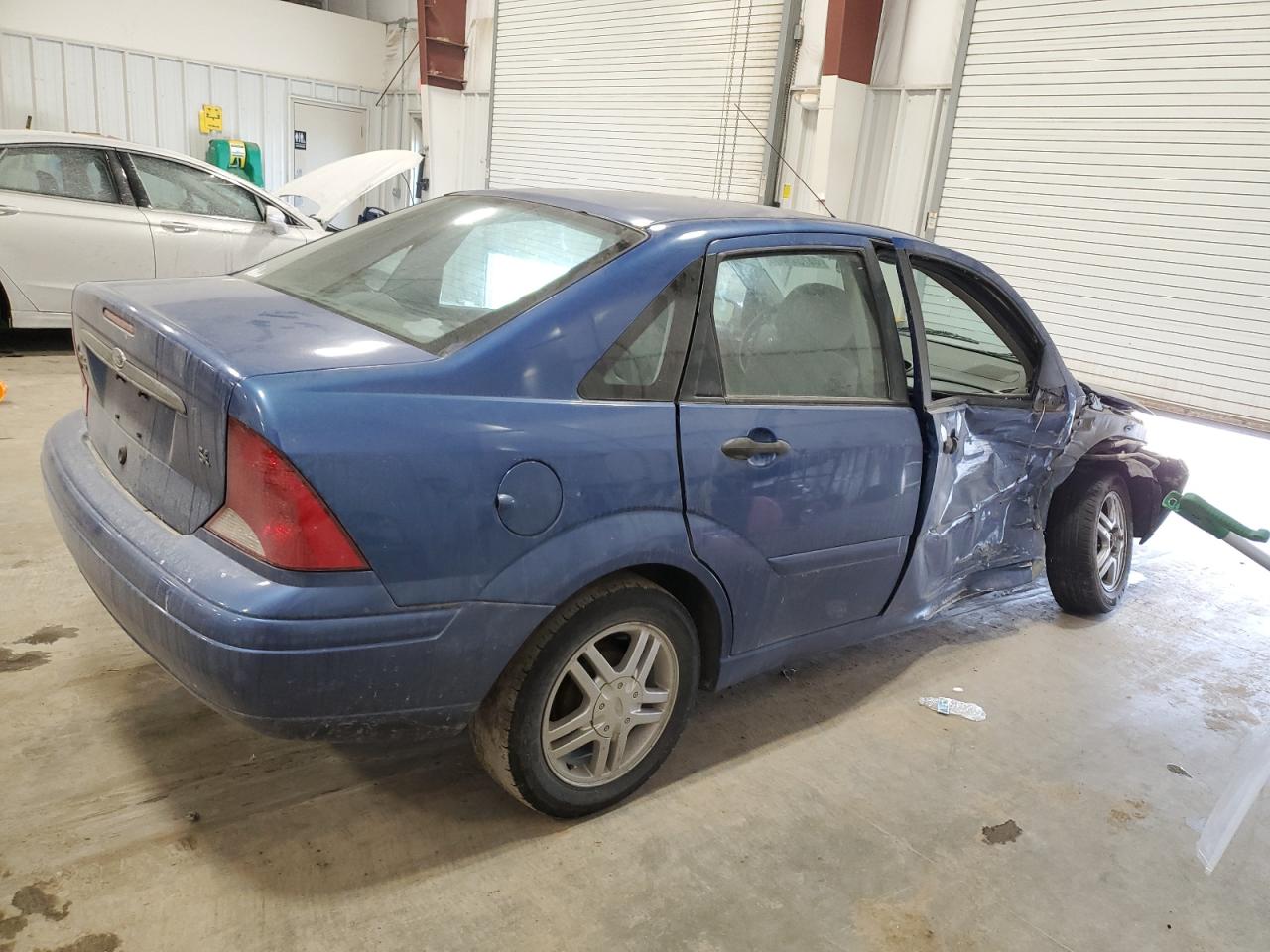 2003 Ford Focus VIN 1FAFP34383W126867 Copart auction photo, front end / side damage thumbnail 3