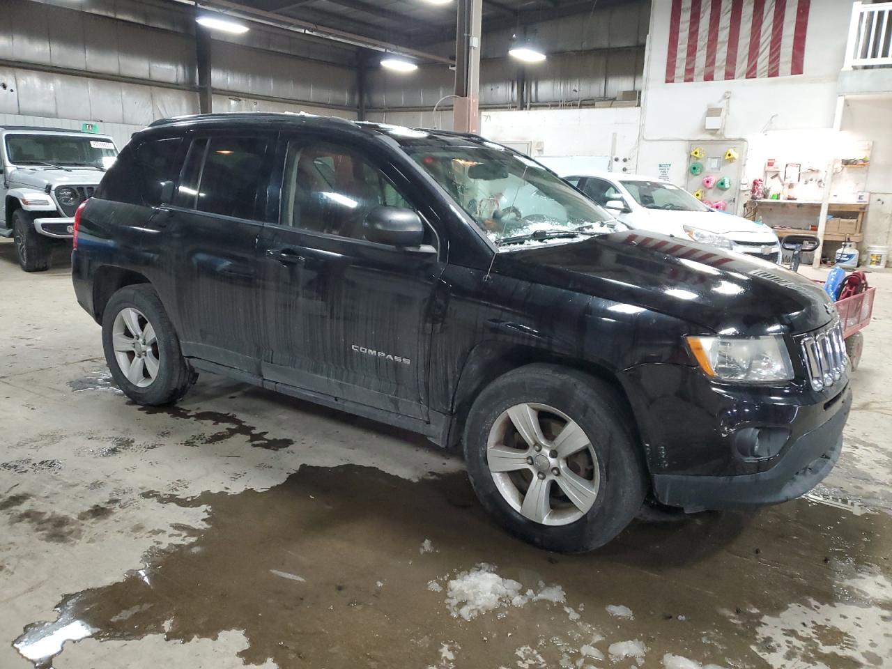 2013 Jeep Compass VIN 1C4NJDEB6DD189773 Copart auction photo, rear end / minor dent/scratches damage thumbnail 4
