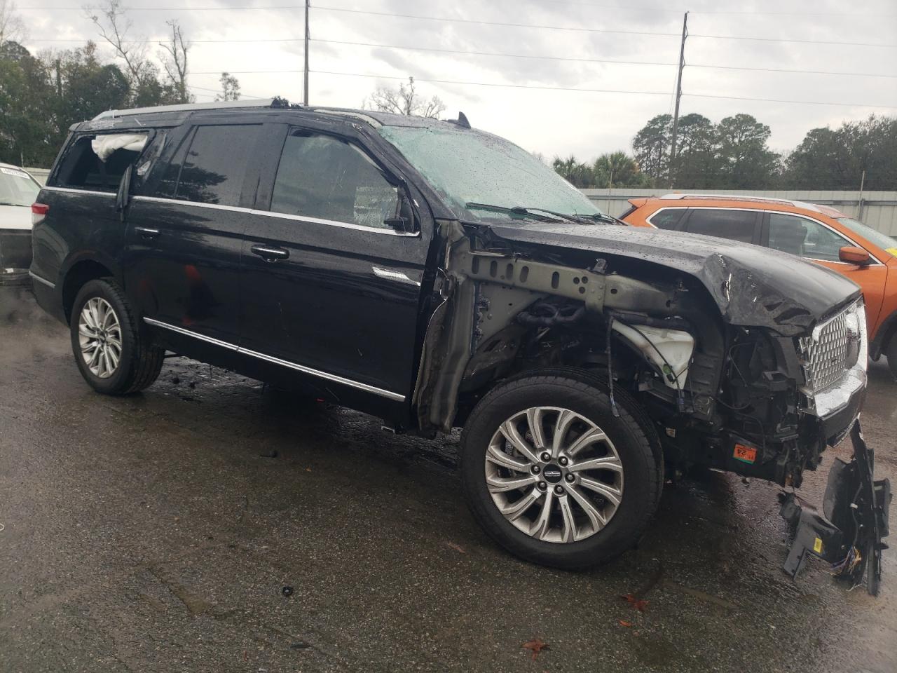 2022 Lincoln Navigator VIN 5LMJJ3NT5NEL05163 Copart auction photo, front end / side damage thumbnail 4