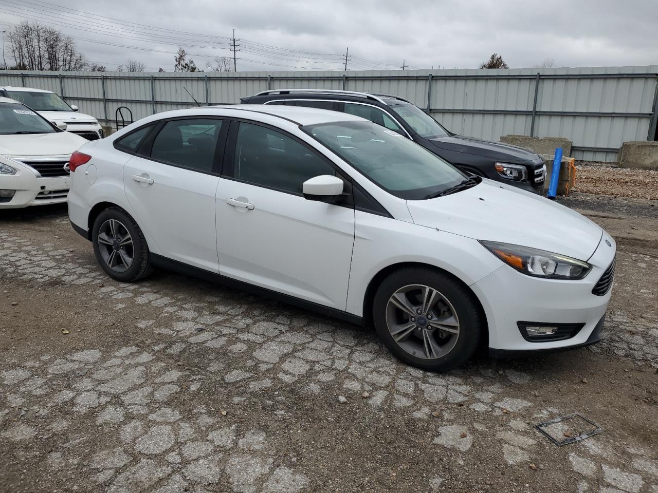 2018 Ford Focus VIN 1FADP3FE3JL223494 Copart auction photo, hail damage thumbnail 4