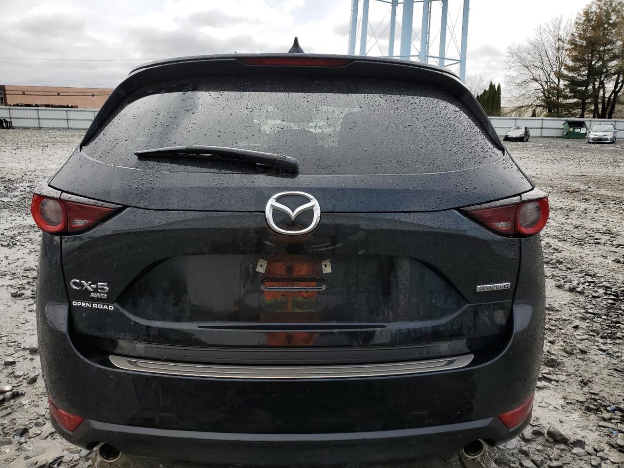2021 Mazda CX-5 VIN JM3KFBCM1M0407582 Copart auction photo, front end damage thumbnail 6