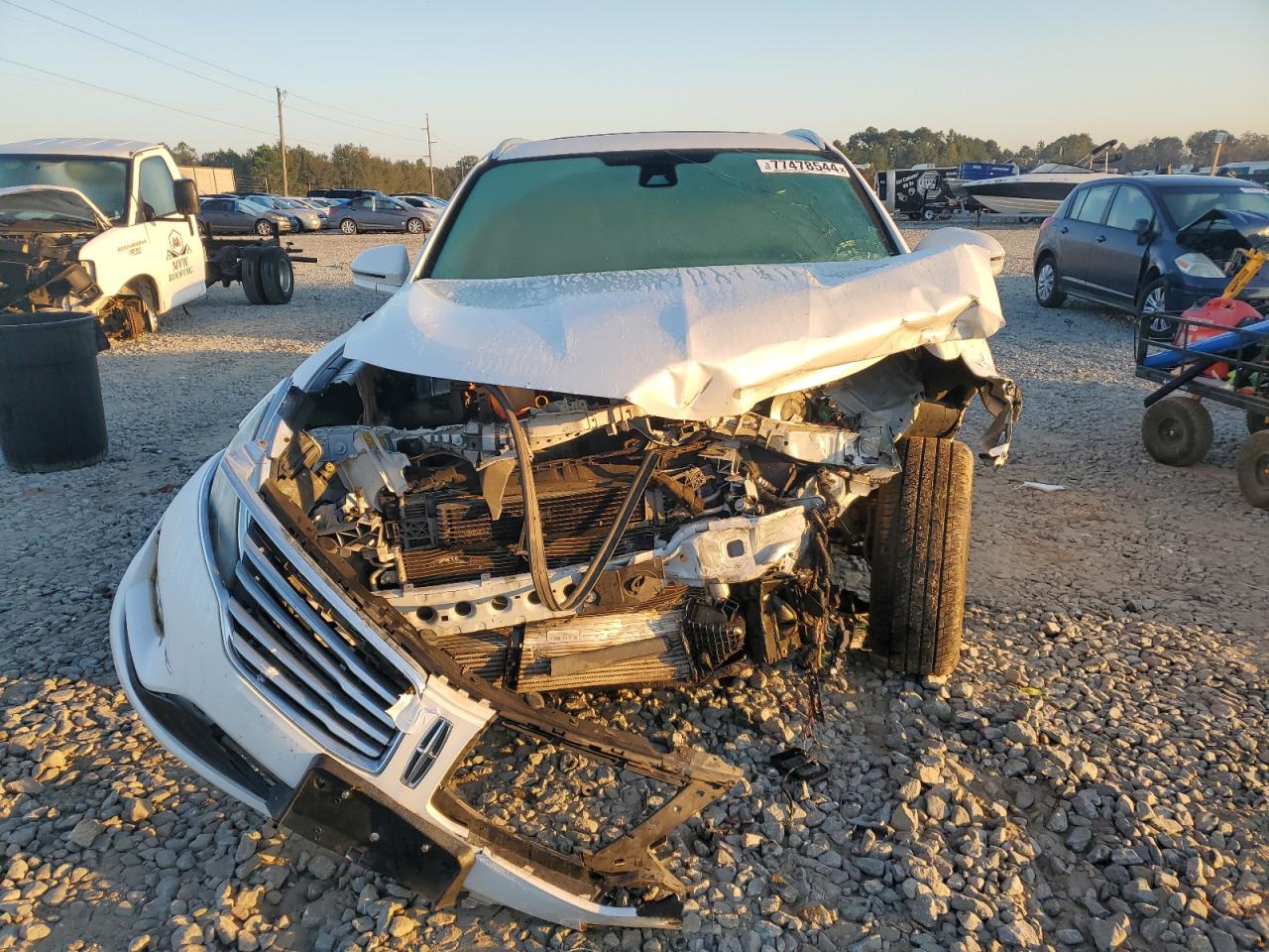 2015 Lincoln MKZ VIN 5LMCJ1A96FUJ15869 Copart auction photo, all over damage thumbnail 5