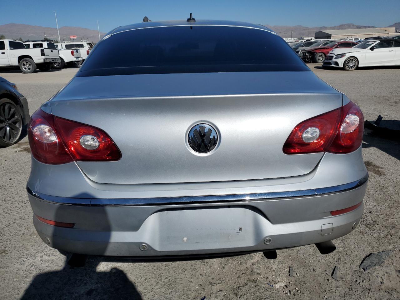 2009 Volkswagen Passat CC VIN WVWGU73C69E558176 Copart auction photo, side damage thumbnail 6