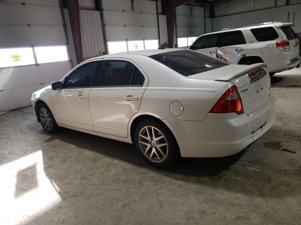 2011 Ford Fusion VIN 3FAHP0JG5BR131377 Copart auction photo, front end / side damage thumbnail 2