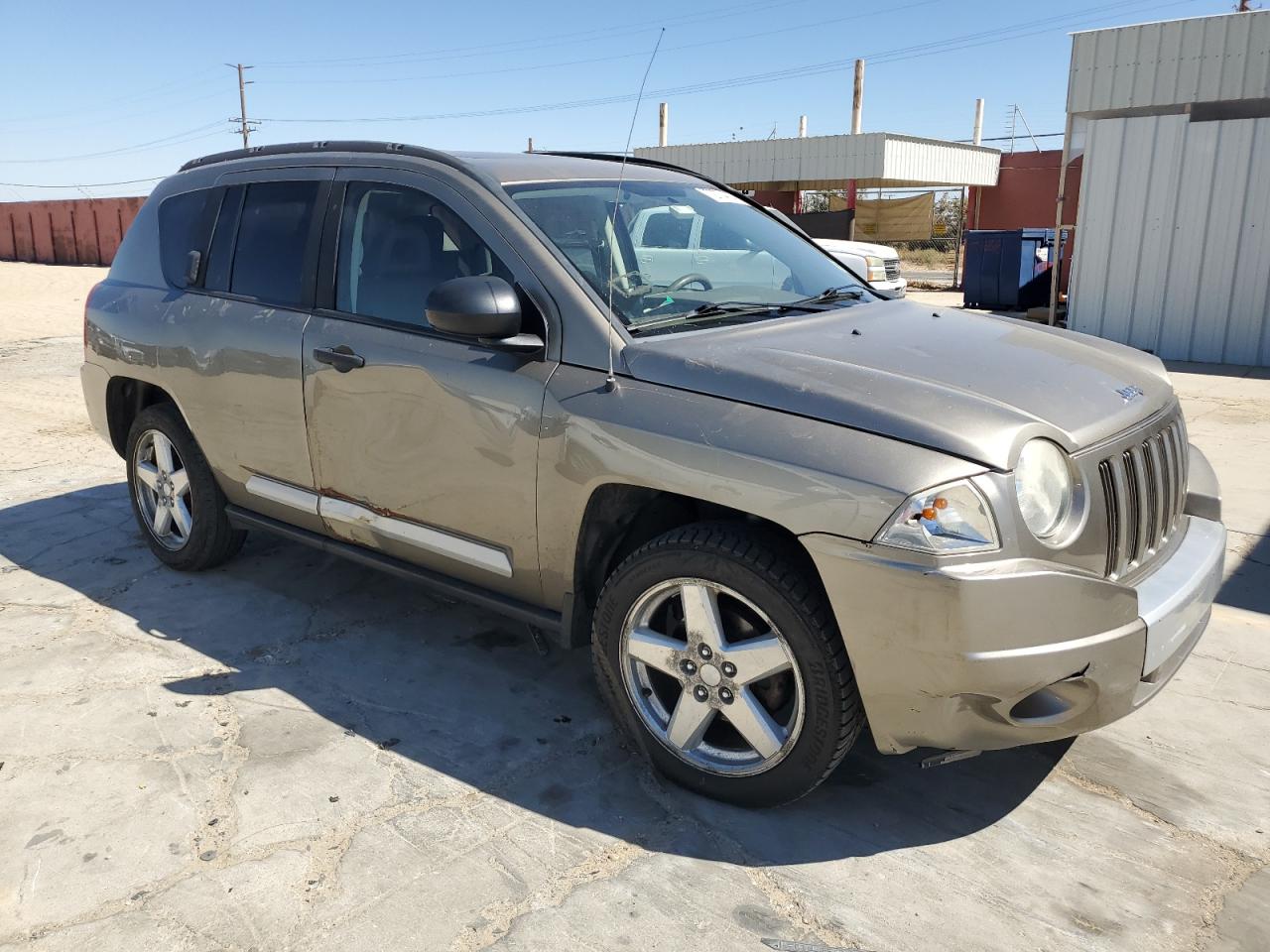 2007 Jeep Compass VIN 1J8FT57W67D145712 Copart auction photo, rear end / side damage thumbnail 4