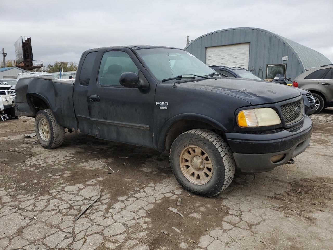 2001 Ford F-150 VIN 1FTRX18W21KA55346 Copart auction photo, rear end / side damage thumbnail 4