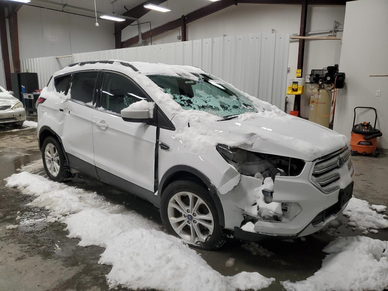 2018 Ford Escape VIN 1FMCU9GD8JUA15057 Copart auction photo, side / front end damage thumbnail 4