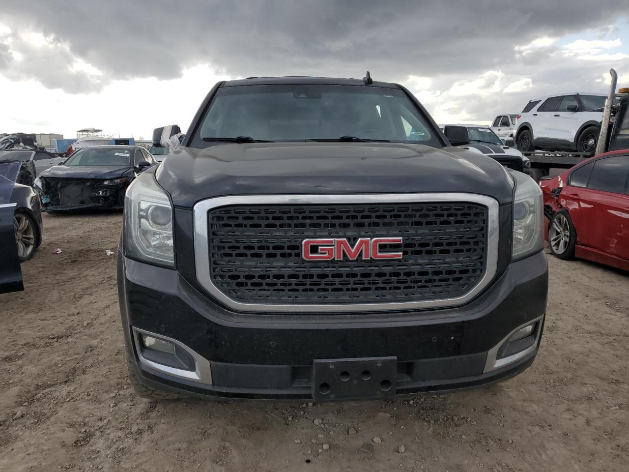 2016 GMC Yukon VIN 1GKS1BKC7GR204782 Copart auction photo, side / front end damage thumbnail 5