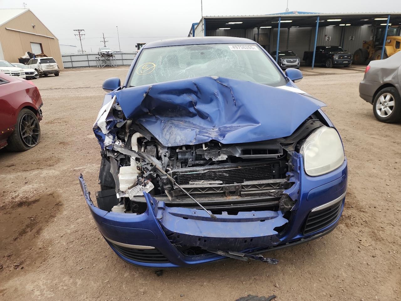 2009 Volkswagen Jetta VIN 3VWRM71K49M123182 Copart auction photo, front end damage thumbnail 5