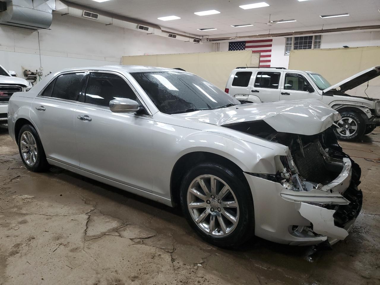 2012 Chrysler 300 VIN 2C3CCACG1CH288568 Copart auction photo, front end / minor dent/scratches damage thumbnail 4