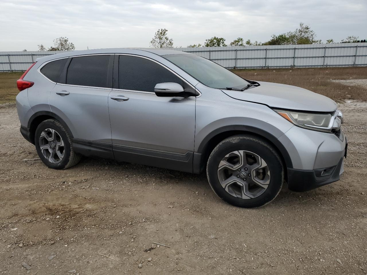 2017 Honda CR-V VIN 7FARW1H52HE016438 Copart auction photo, side / front end damage thumbnail 4