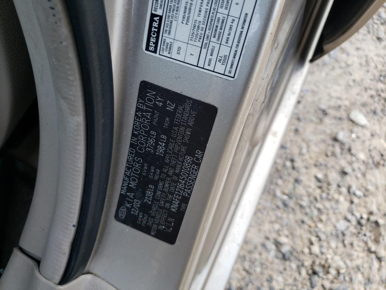 2004 KIA Spectra VIN KNAFE121645010898 Copart auction photo, all over damage thumbnail 14
