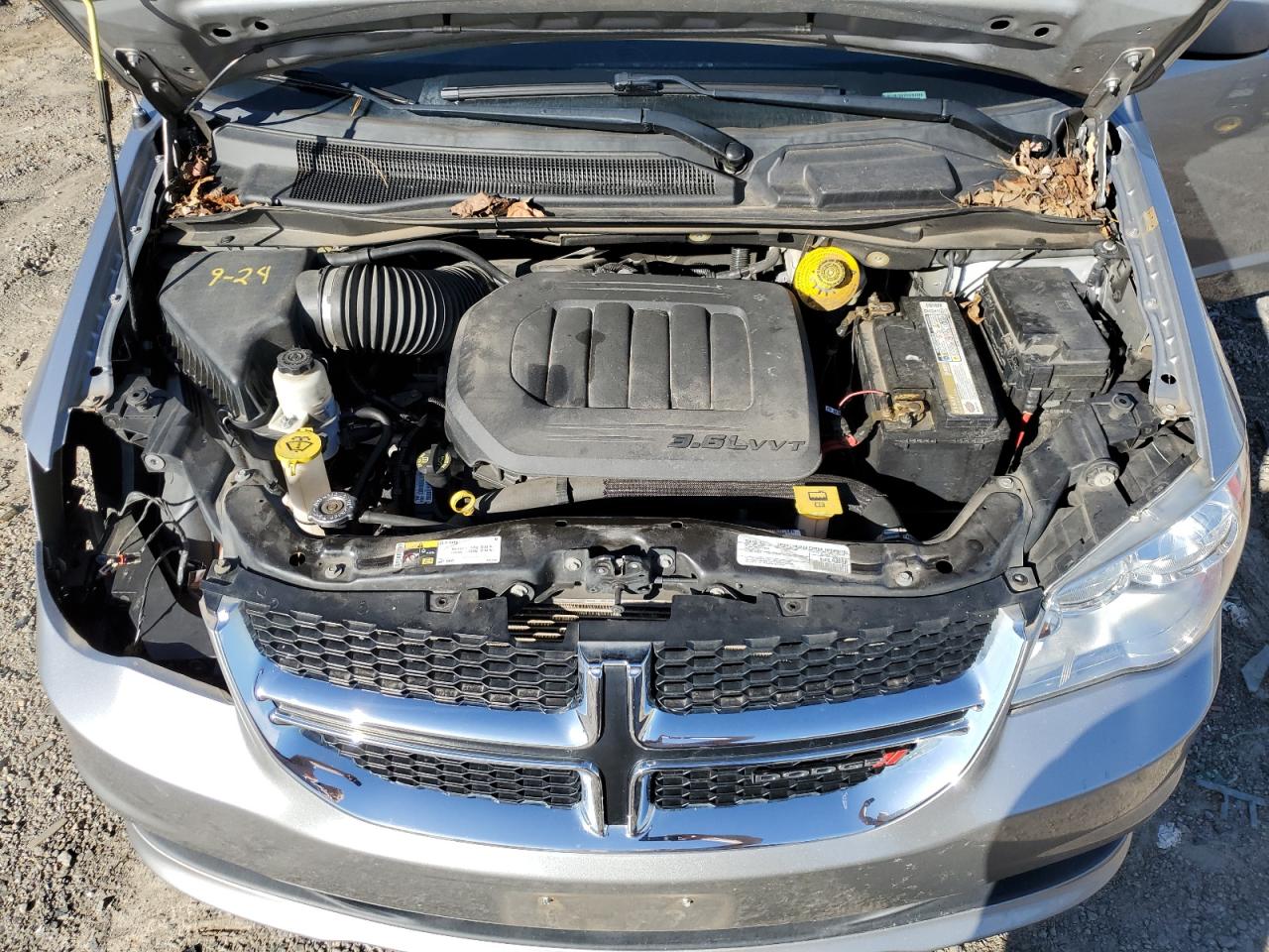 2019 Dodge Caravan VIN 2C4RDGCG2KR600170 Copart auction photo, side / all over damage thumbnail 12