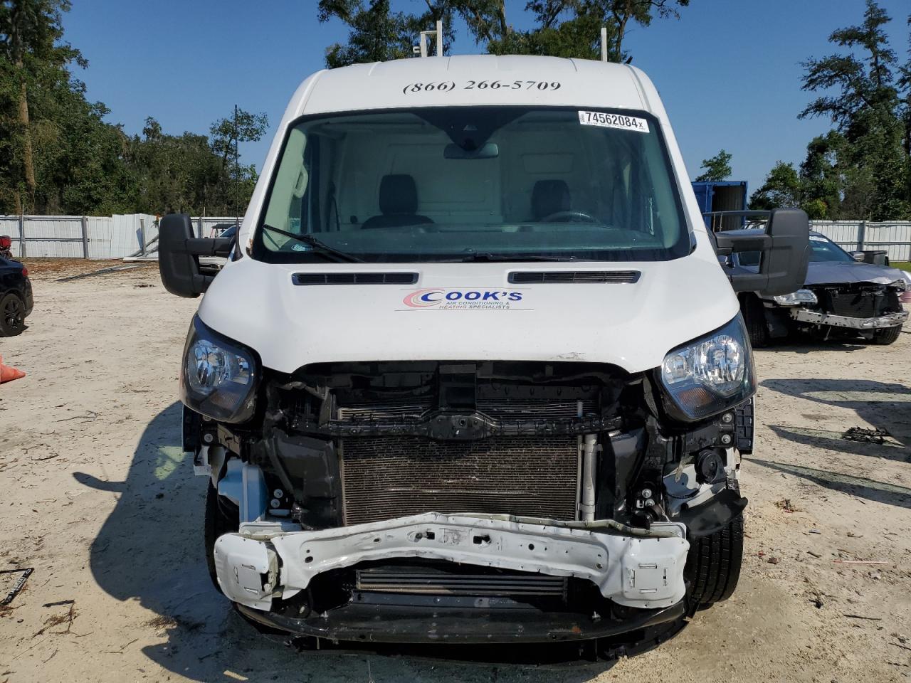 2021 Ford Transit VIN 1FTBR1CG5MKA07758 Copart auction photo, front end / side damage thumbnail 5