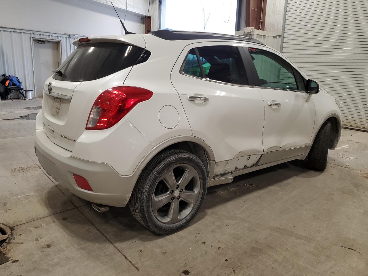 2014 Buick Encore VIN KL4CJCSBXEB619799 Copart auction photo, side damage thumbnail 3