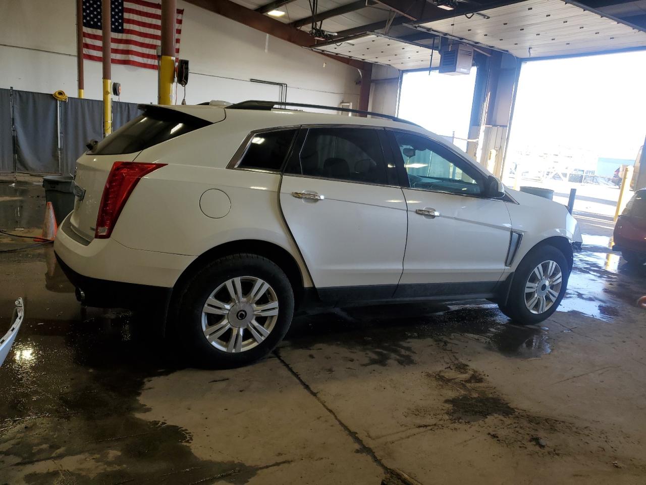 2015 Cadillac SRX VIN 3GYFNAE32FS609168 Copart auction photo, front end damage thumbnail 3