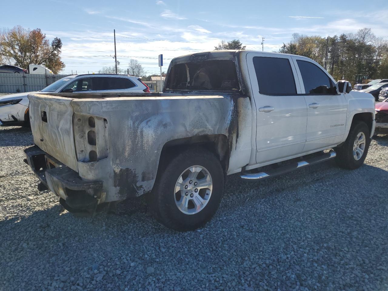 2018 Chevrolet Silverado VIN 3GCUKRECXJG156126 Copart auction photo, burn damage thumbnail 3