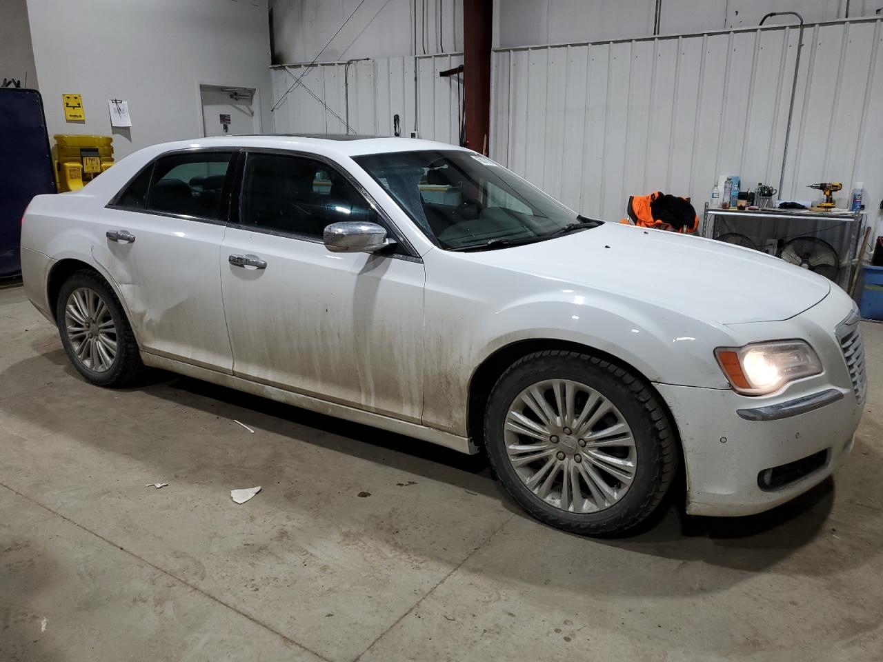2014 Chrysler 300 VIN 2C3CCAKT0EH288174 Copart auction photo, side / minor dent/scratches damage thumbnail 4