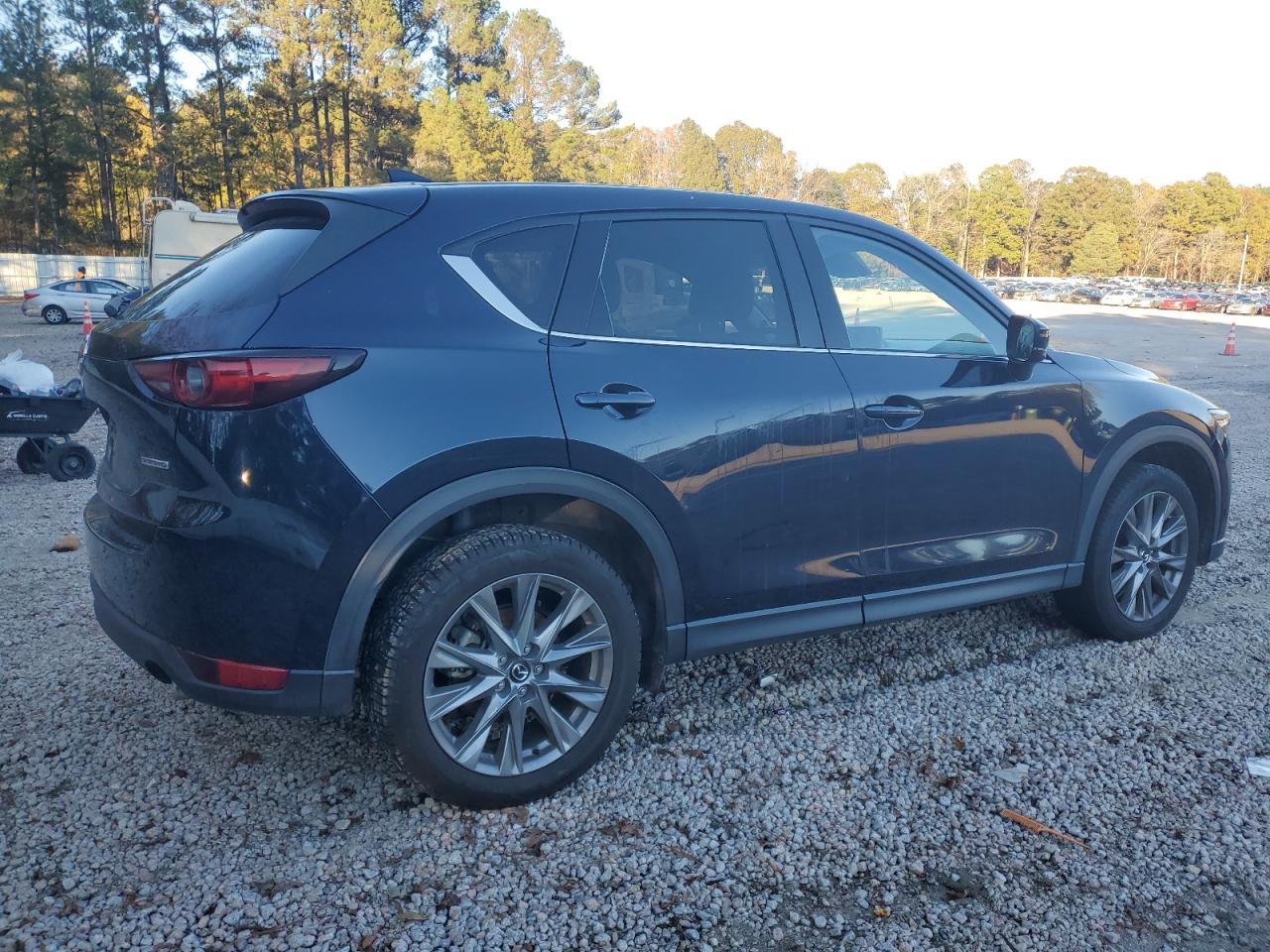 2021 Mazda CX-5 VIN JM3KFBDM9M0360719 Copart auction photo, front end / side damage thumbnail 3