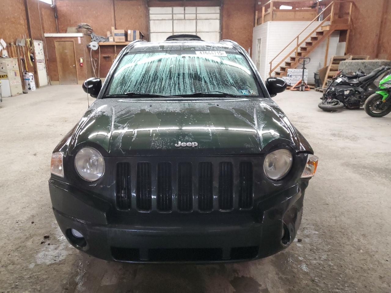 2010 Jeep Compass VIN 1J4NF4FB5AD589426 Copart auction photo, front end damage thumbnail 5