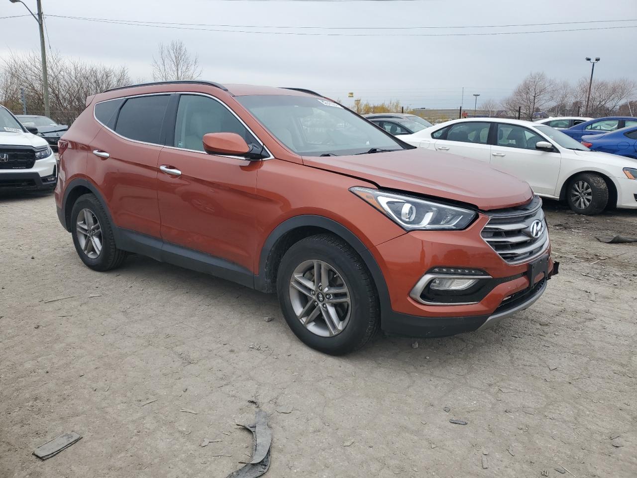 2017 Hyundai Santa Fe VIN 5XYZU3LB6HG423164 Copart auction photo, front end / minor dent/scratches damage thumbnail 4