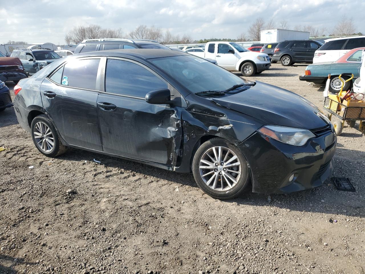 2015 Toyota Corolla VIN 5YFBURHEXFP211674 Copart auction photo, front end / side damage thumbnail 4