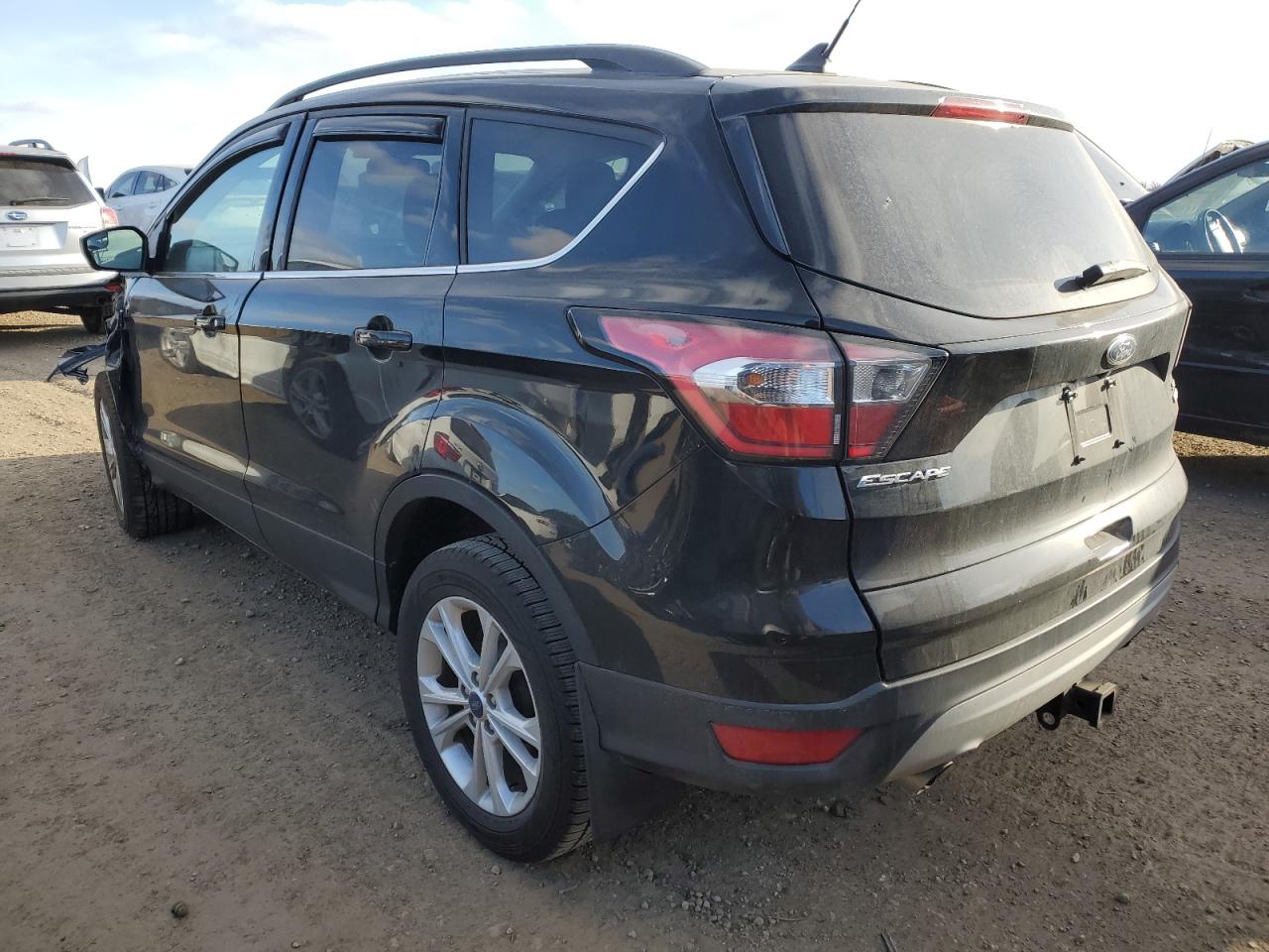 2018 Ford Escape VIN 1FMCU9GD4JUD55757 Copart auction photo, front end / side damage thumbnail 2
