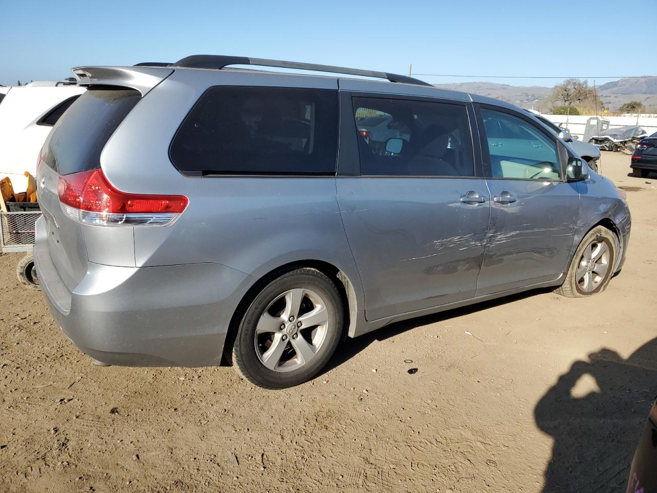 2011 Toyota Sienna VIN 5TDKK3DC6BS078226 Copart auction photo, side / front end damage thumbnail 3
