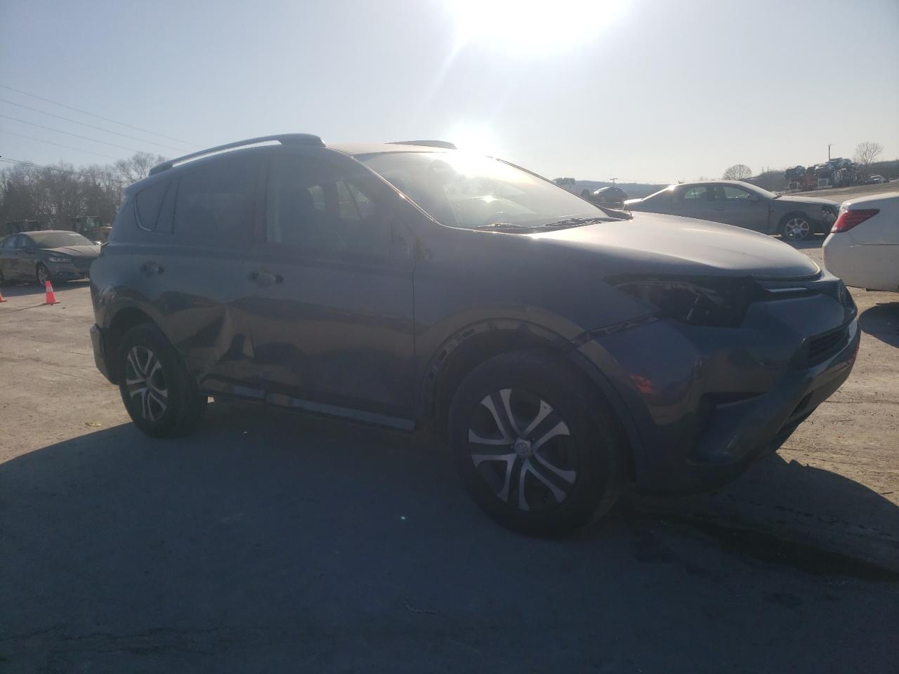 2017 Toyota RAV 4 VIN JTMBFREV3HJ125595 Copart auction photo, side / front end damage thumbnail 4