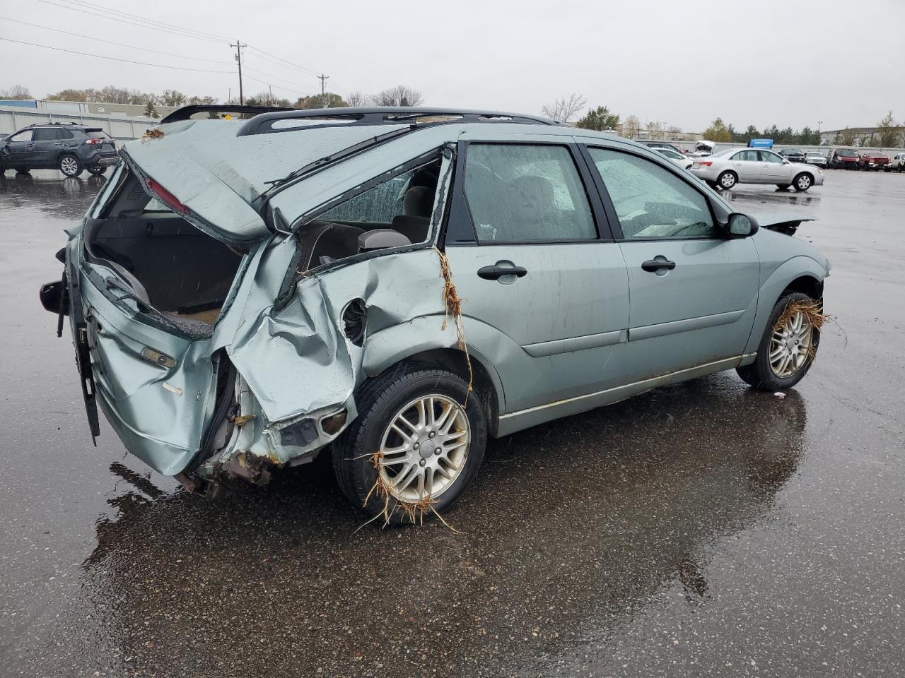 2003 Ford Focus VIN 1FAFP36363W126671 Copart auction photo, rollover damage thumbnail 3