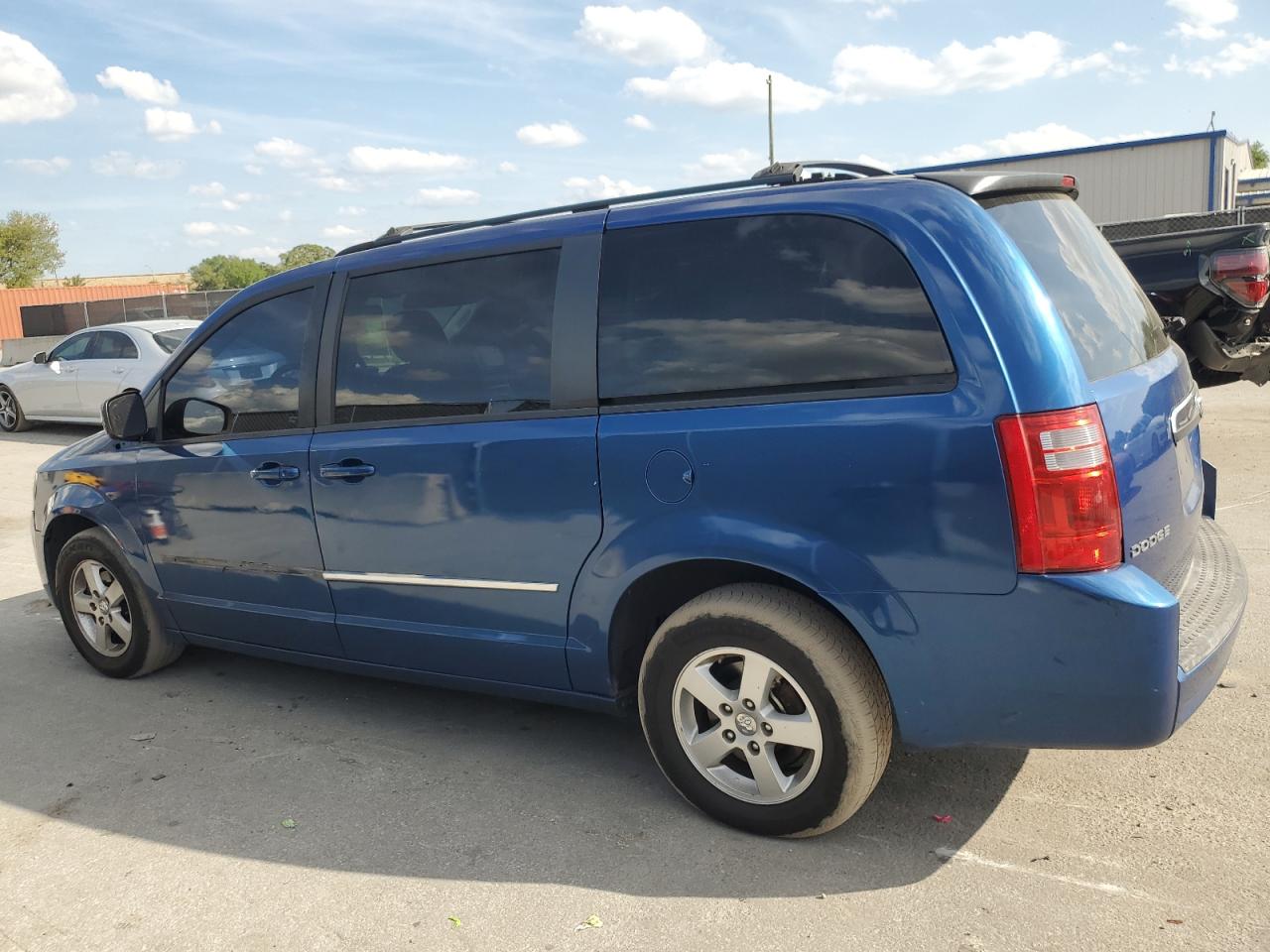 2010 Dodge Caravan VIN 2D4RN5D12AR215687 Copart auction photo, side damage thumbnail 2