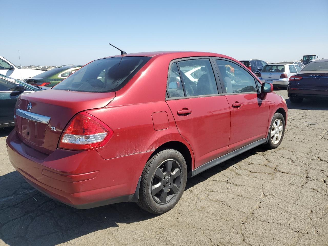 2010 Nissan Versa VIN 3N1BC1AP1AL371810 Copart auction photo, stripped damage thumbnail 3