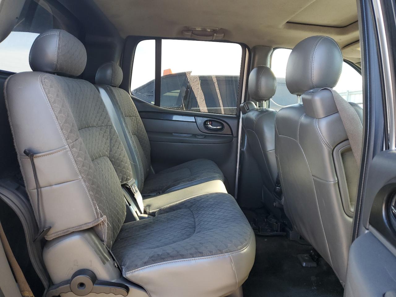 2004 GMC Envoy VIN 1GKET12S246173091 Copart auction photo, side damage thumbnail 11