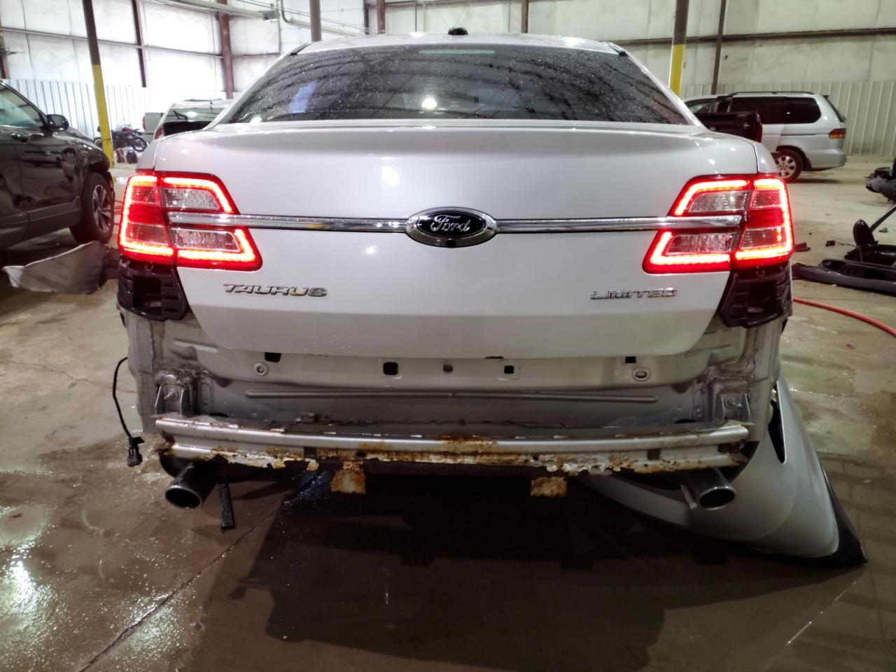 2014 Ford Taurus VIN 1FAHP2F87EG151011 Copart auction photo, side / rear end damage thumbnail 6