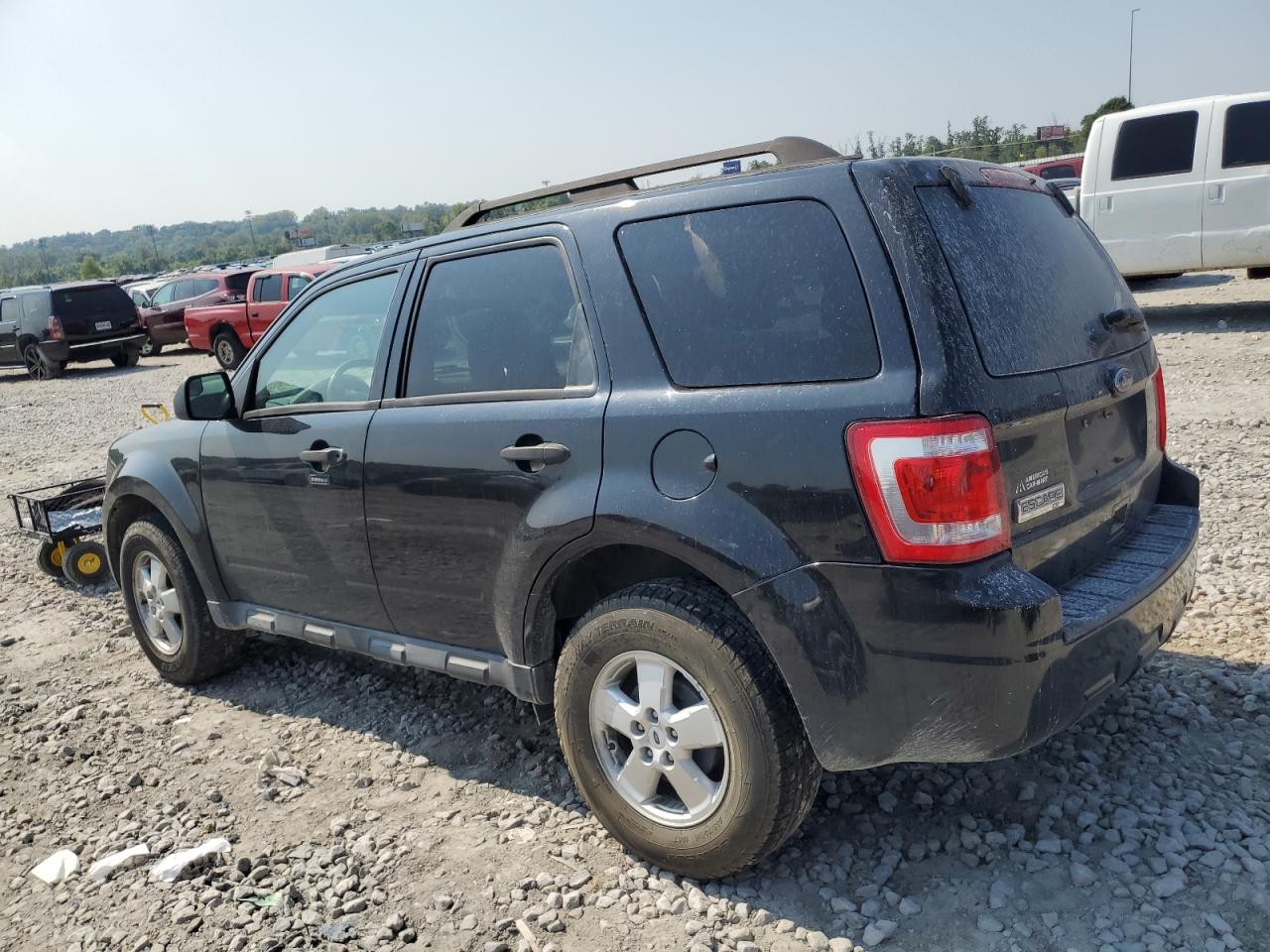 2011 Ford Escape VIN 1FMCU9D79BKC12587 Copart auction photo, side damage thumbnail 2