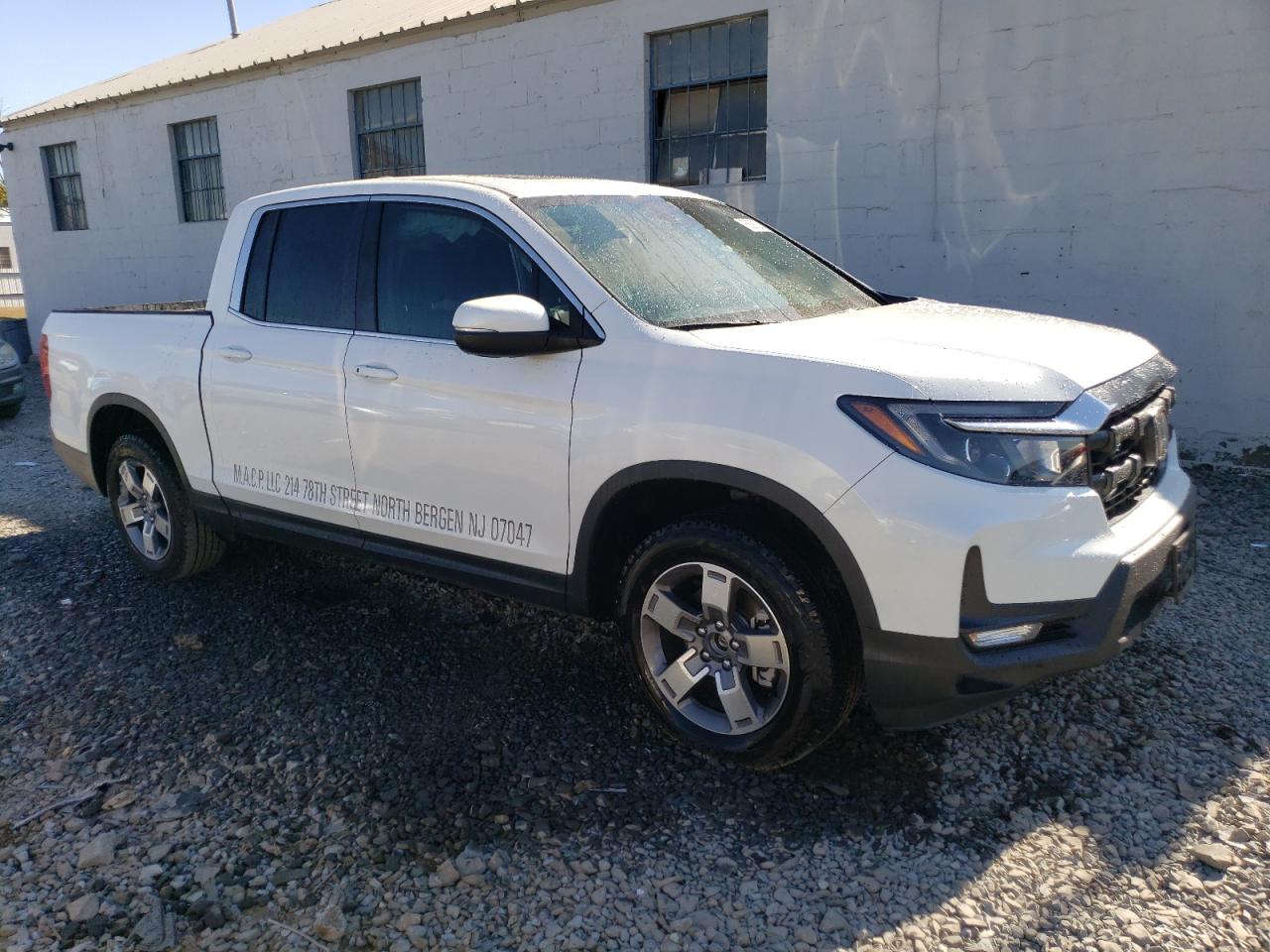 2024 Honda Ridgeline VIN 5FPYK3F52RB008754 Copart auction photo, side damage thumbnail 4