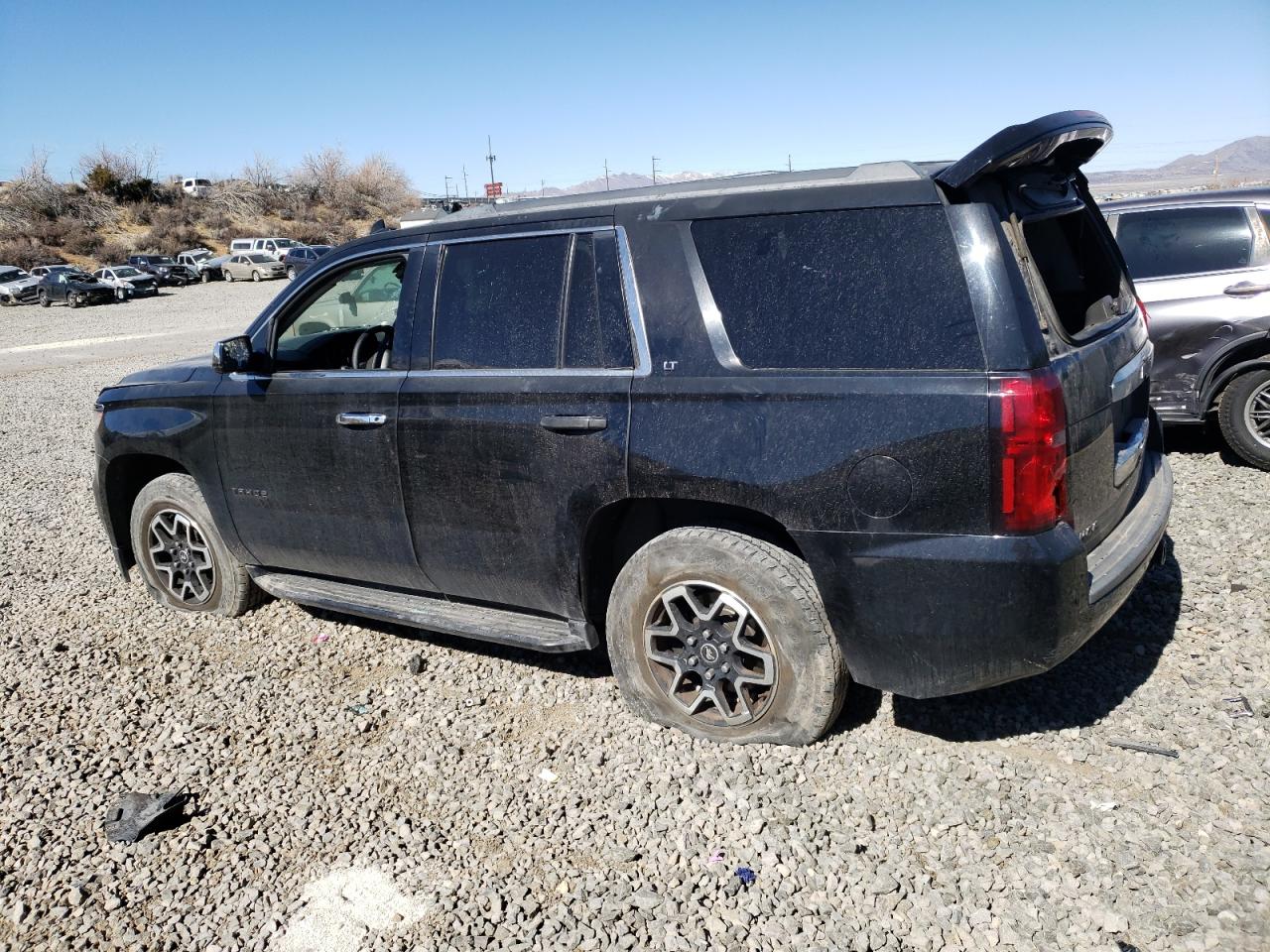 2015 Chevrolet Tahoe VIN 1GNSKBKC7FR502134 Copart auction photo, vandalism / all over damage thumbnail 2