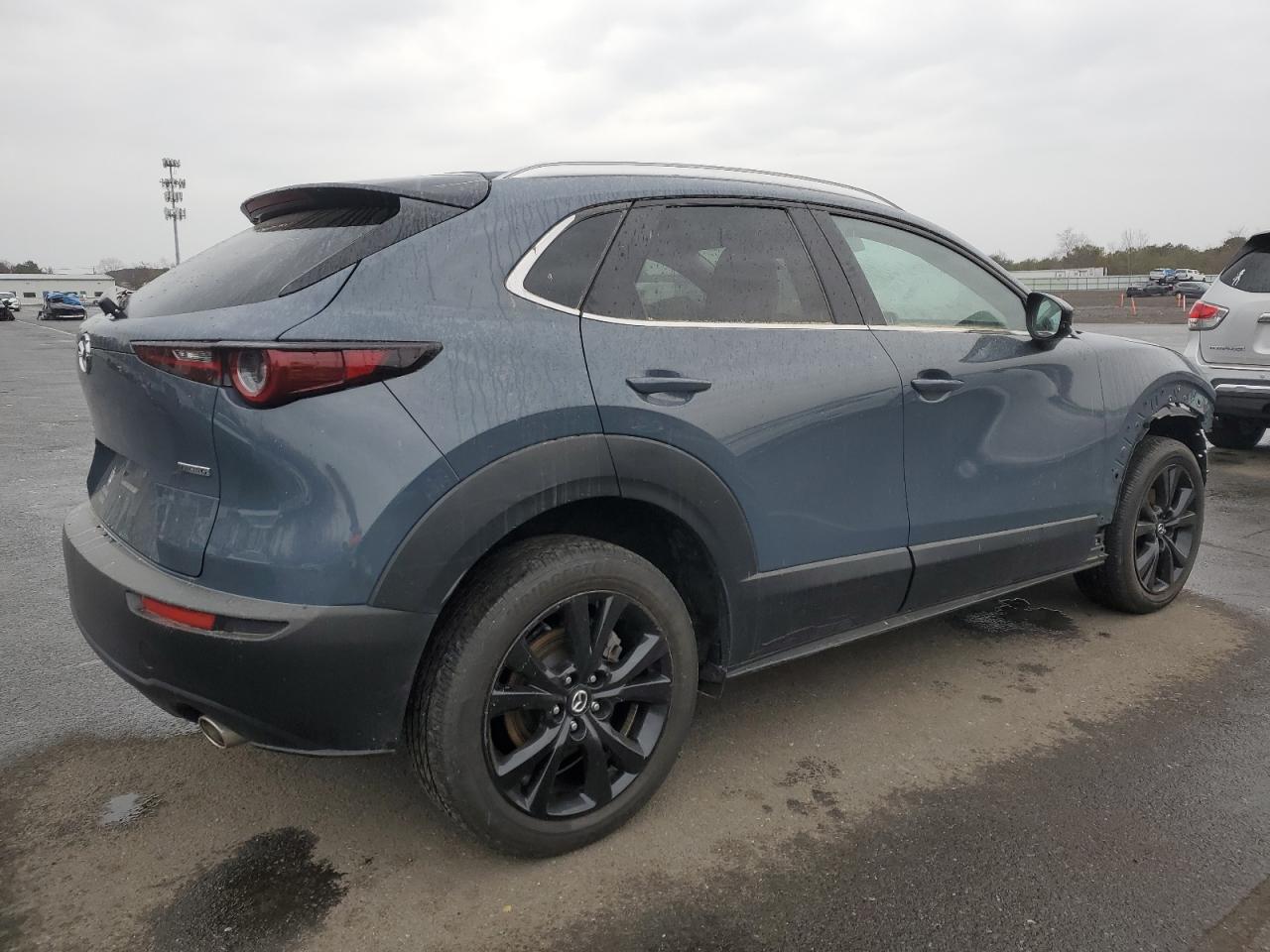2023 Mazda CX-30 VIN 3MVDMBCM5PM556195 Copart auction photo, front end / minor dent/scratches damage thumbnail 3