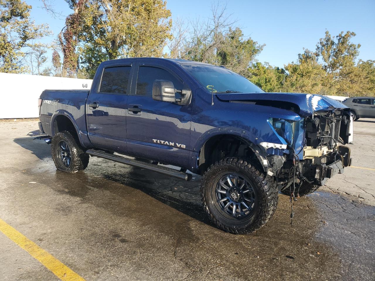 2019 Nissan Titan VIN 1N6AA1E5XKN518566 Copart auction photo, front end damage thumbnail 4