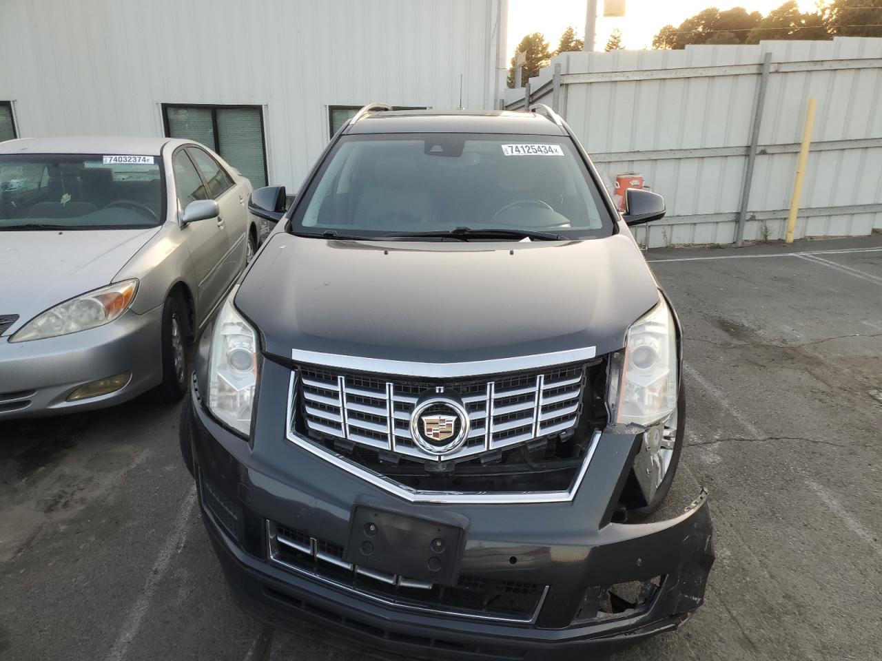 2015 Cadillac SRX VIN 3GYFNBE31FS604100 Copart auction photo, front end damage thumbnail 5