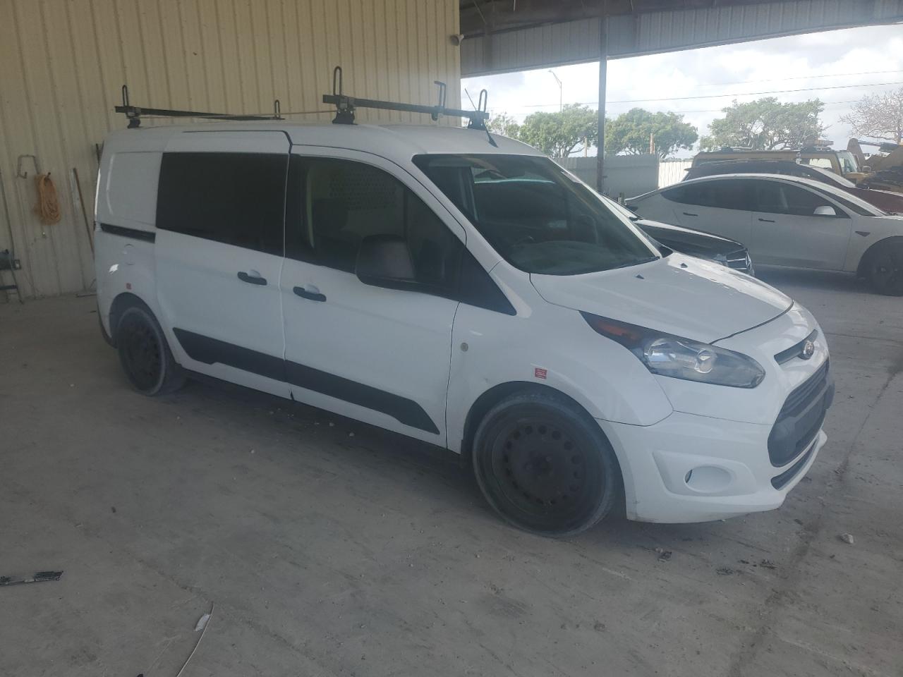 2015 Ford Transit VIN NM0LS7F70F1221702 Copart auction photo, water/flood damage thumbnail 4