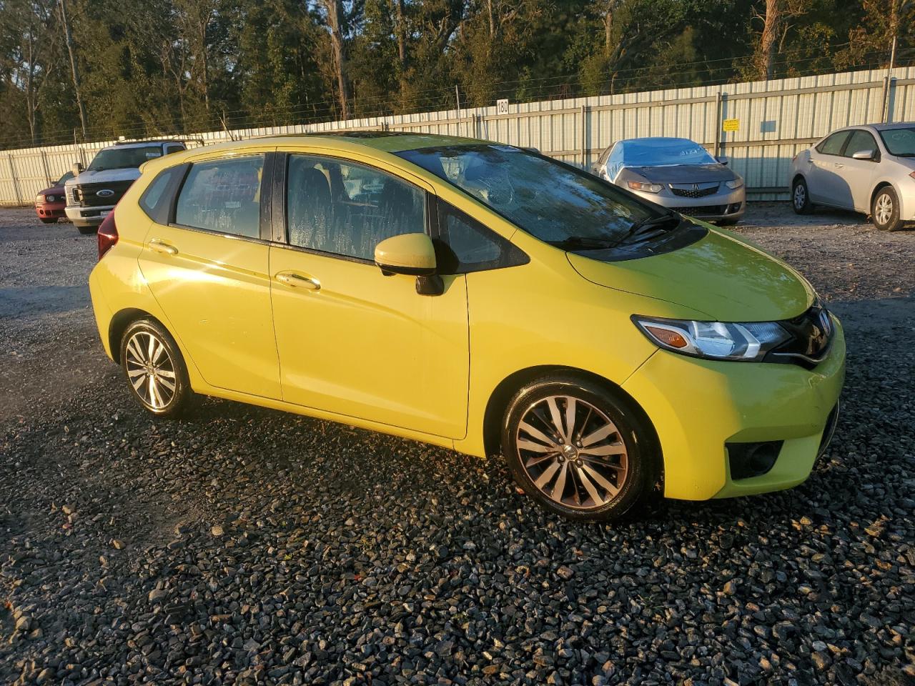 2015 Honda Fit VIN 3HGGK5H87FM771644 Copart auction photo, top/roof damage thumbnail 4